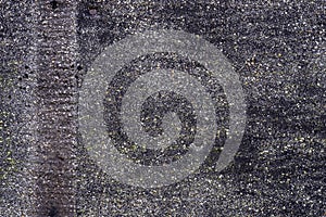 Old dark tar paper texture background