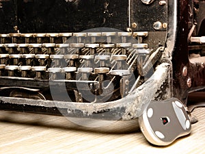 Old dark typewriter with modern mouse