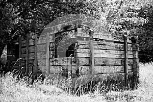 old decayed wooden house construction