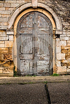 Old decaying wooden double doors photo