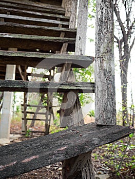 Old decaying wooden staircase.