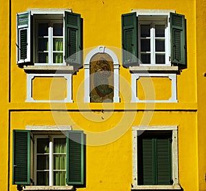 Old decorated facade and shutters, Bolzano Italy photo