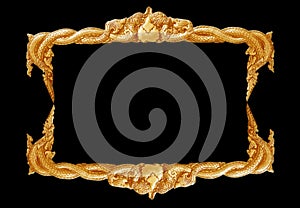 Old decorative gold frame - handmade, engraved - isolated on black background.