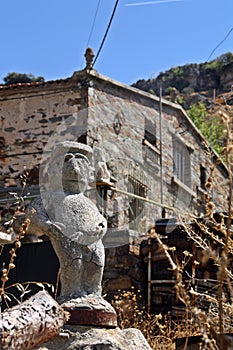 Old Decorative Stone figure, in Patones de arriba, a small village of Madrid, Spain. photo