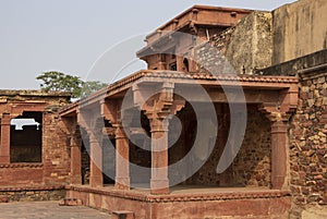Old and deralict red stone building in India