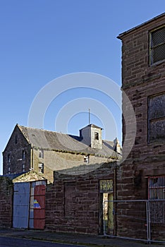 Old derelict traditional Stone Port Warehouses next to Montrose Port on the East Coast of Scotland