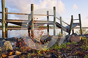 Old derelict wharves on  Pioneer River at Mackay