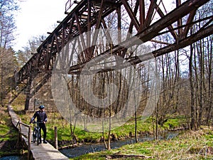 Old desolate bridge and bike path