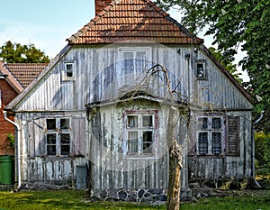 Old desolate wooden  white house