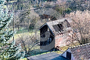 Old destroed hut rotting in the garden