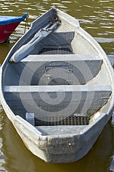 Old destroyed boat left on the river