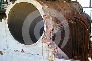 Old, destroyed vintage steam boiler heating system.