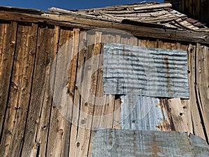 Old Deteriorating Wood and Corrugated Steel Background