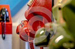 Old dial analogue colourful telephones