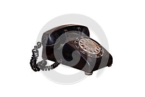 The old dial phone is dirty and scratched isolated