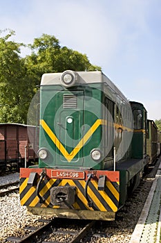Old diesel train in rail yard