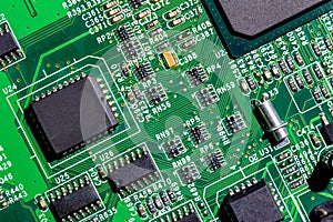 old digital circuit board with microprocessors and components, closeup full-frame macro background