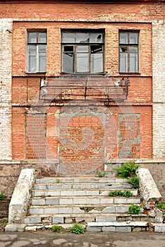 The old dilapidated building of red bricks