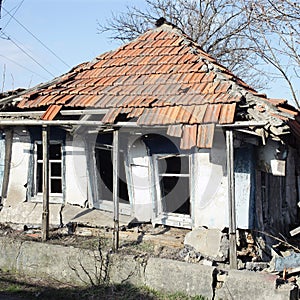 Old dilapidated house dilapidated with clay orange tiles