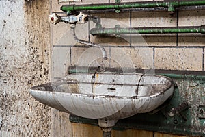 Old dilapidated washbasin