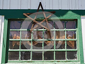 Old Dilapidated Window With Wood Star Decoration