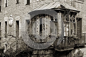 Old and dilapidated wooden gazebo with balcony. Bergara