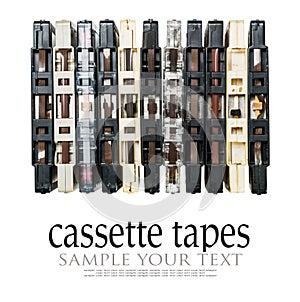 Old and dirty audio cassettes isolated on white