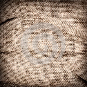 Old dirty brown burlap texture. Square woven