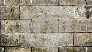 Old and dirty cement cinder block wall texture.