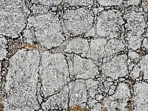 Old dirty cracked concrete wall texture background  road