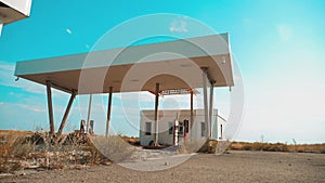 Old dirty deserted lifestyle gas station. U.S. Route 66. crisis road 66 fueling slow motion video. closed supermarket