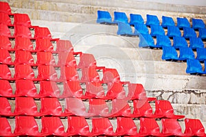 Old and Dirty Empty Plastic Chairs at the Stadium