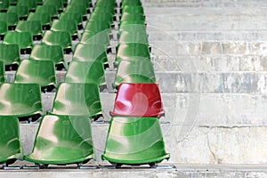 Old and Dirty Empty Plastic Chairs at the Stadium