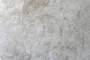 Old dirty grey concrete background texture used in decorative art work. Gray concrete wall texture with strange pattern and