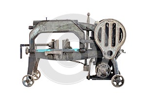 Old dirty hacksaw machine industry tool. Isolated.