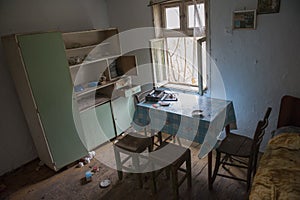 Old dirty kitchen in abandoned house