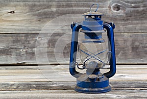 Old dirty Lantern on aged wood