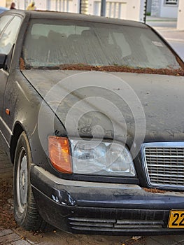 Old dirty Mercedes s-class car