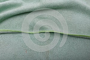 Old dirty microbibra fabric towel or napkin texture photo