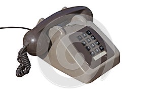 An old and dirty number pad telephone