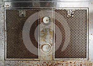 Old dirty with oil stain on cooker hood , in the kitchen