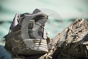 Old and dirty sport shoes. Shallow depth of field.