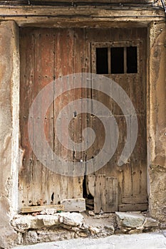 Old dirty wooden door locked Europa