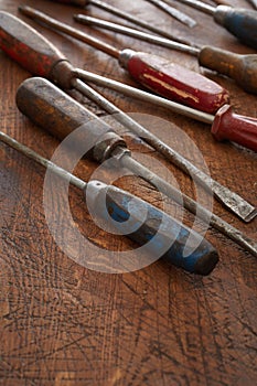 Old dirty worn vintage wooden screwdrivers