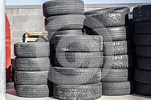 Old, discarded tires, tyres, waiting for the scrap heap or to be recycled
