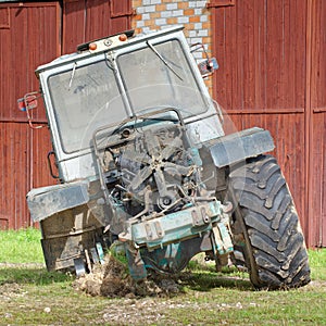 Old dismantled tractor front view