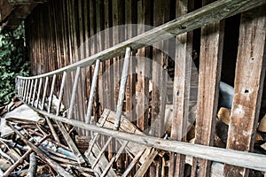 Old distorted wooden ladder