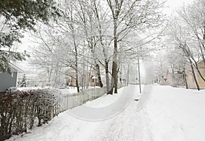 Old district of wooden houses on gloomy winter day