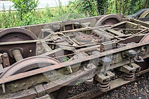 Old disused rusty train bogey photo