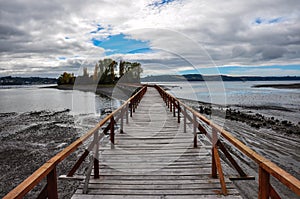 Old dock linking to an isolated island, ChiloÃÂ© Is